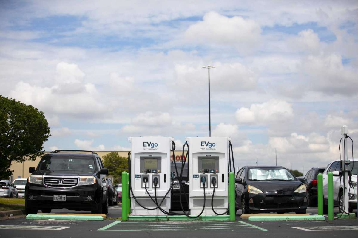 Two charging stations positioned wait for users in the parking lot outside H&M at Katy Mills Mall on August 29, 2021.