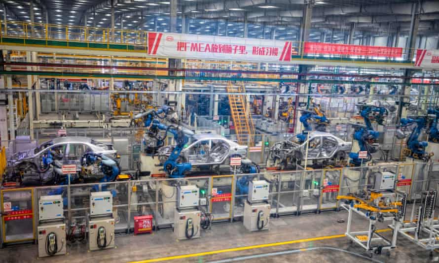 Robots assemble cars in the BYD electric car factory in Xi’an, Shaanxi, China
