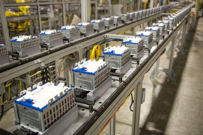 Battery cell modules travel down the line to be assembled into eAssist and hybrid electric vehicle packs at the GM Brownstown Battery Assembly Plant in Brownstown Township. The facility assembles six different batteries supporting nine GM vehicles.