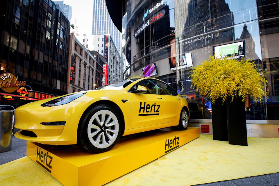 A Hertz Tesla electric vehicle is displayed during the Hertz Corporation IPO at the Nasdaq Market site in Times Square in New York City, U.S., November 9, 2021. REUTERS/Brendan McDermid