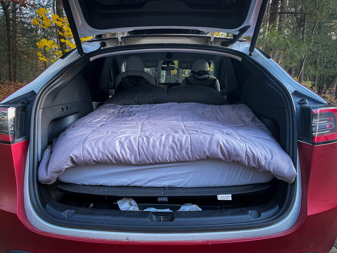 Back of electric vehicle with mattress