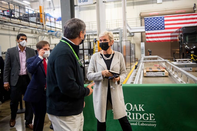 Richard Raines, director of the Electrification and Energy Infrastructures Division at Oak Ridge National Laboratory, takes U.S. Secretary of Energy Jennifer M. Granholm, right, on a tour of GRID-C at ORNL's Hardin Valley campus in Knoxville, Tenn., on Monday, Nov. 22, 2021. Raines recently spoke to a Friends of ORNL audience about electric vehicles, batteries and more.