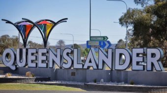 The Queenslander sign in the NSW-Queensland border town of Wallangarra in Queensland on October 8, 2020.