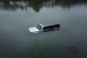 Ford Bronco gets stuck on sandbar, flooded by ocean over multiple days